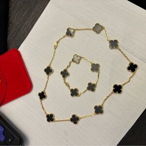 Elegant Black and Gold Clover Necklace